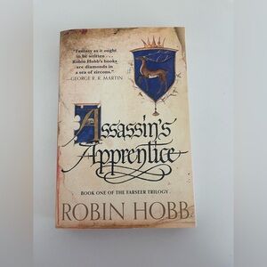 “Assassin’s Apprentice” by Robin Hobb (The Farseer Trilogy) Softback